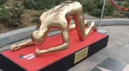 Drug taking Oscar sculpture